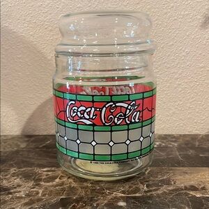 Vintage Coca-Cola Glass Jar with Red and Green Design